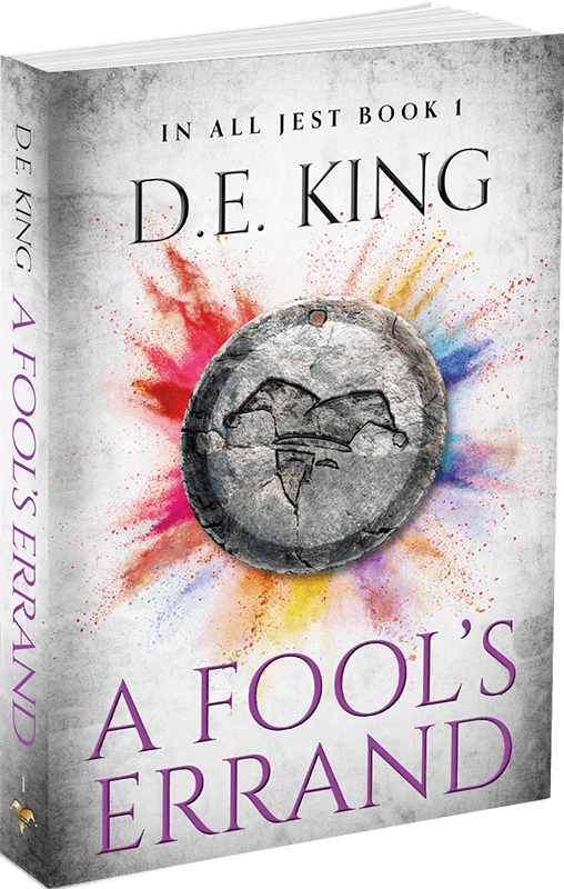 3D-rendered book titled A Fool’s Errand by D.E. King with metallic ring and desert backdrop