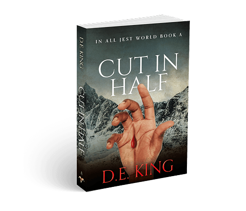 3D book cover of Cut in Half by D.E. King, featuring a severed hand with a bleeding finger against a snowy mountain backdrop.