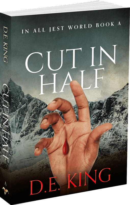 3D book cover of Cut in Half by D.E. King, featuring a severed hand with a bleeding finger against a snowy mountain backdrop.