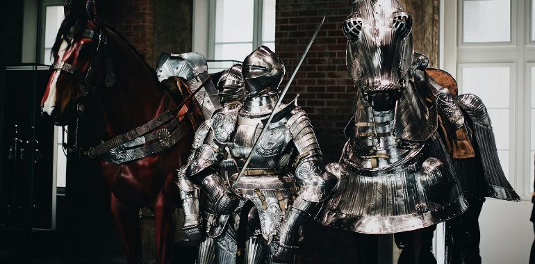 knight in armour and sword with horse